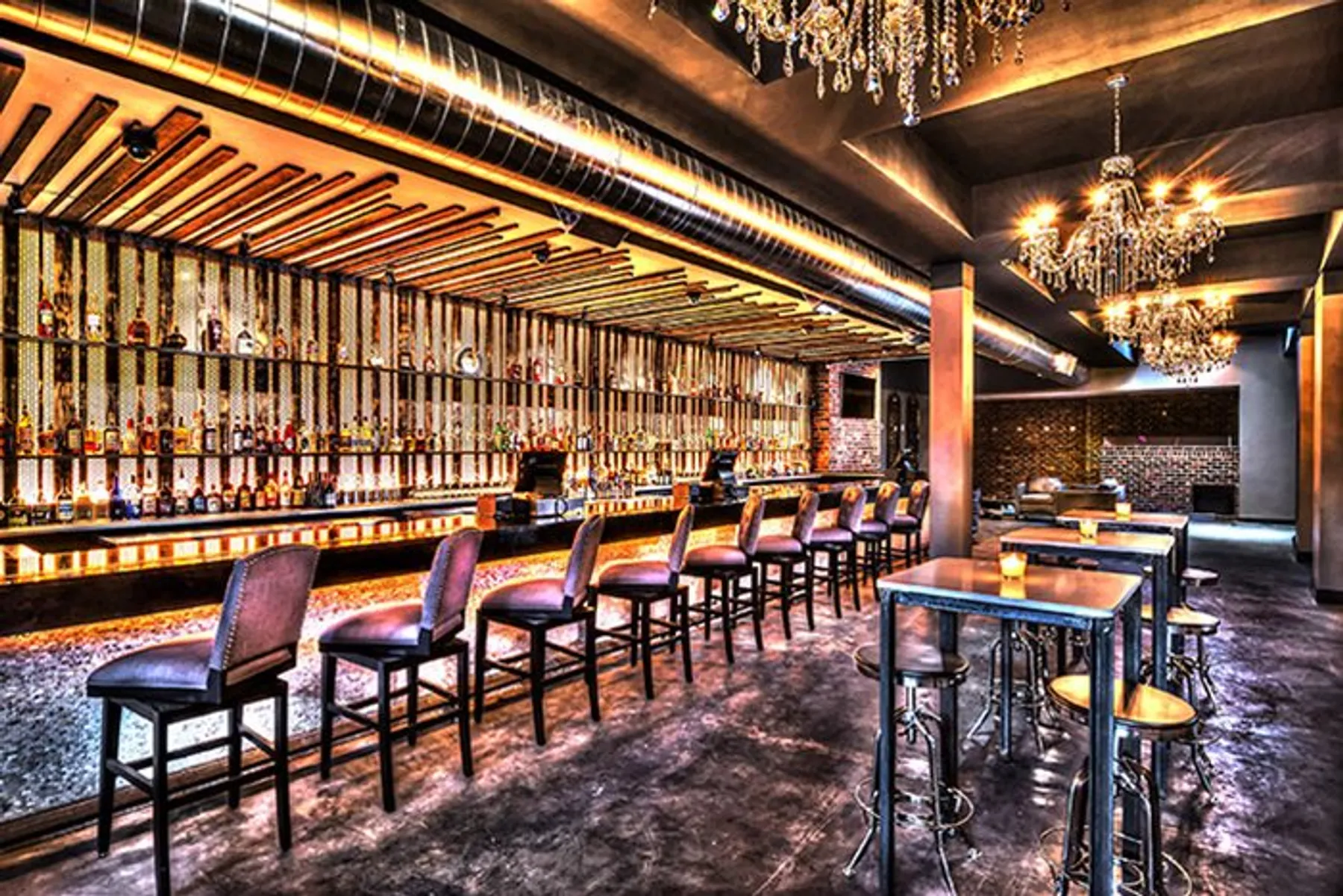Bar with seating and tables modern Downtown Houston Bar Henke & Pilot